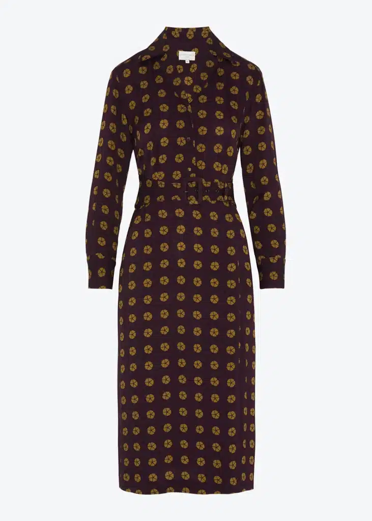A women's dress with polka dots on it.